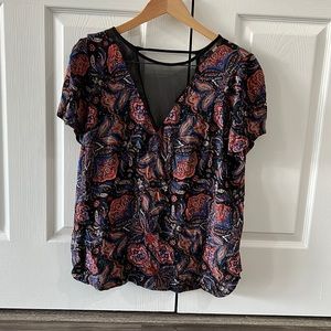 Print top with lace front V neck and low back V neck.